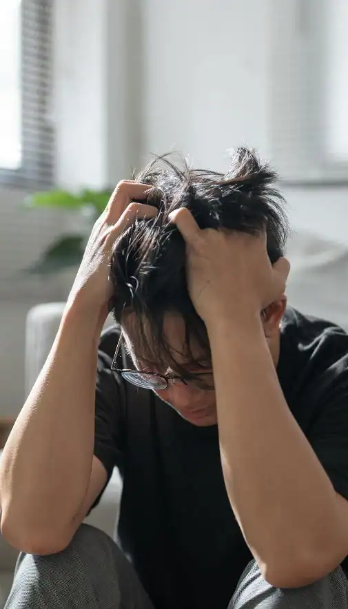 Image of upset man because of erectile dysfunction symptoms Ipswich