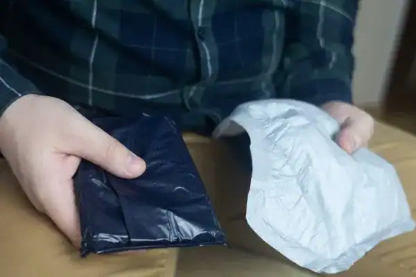 image of man holding stool incontinence Ipswich products